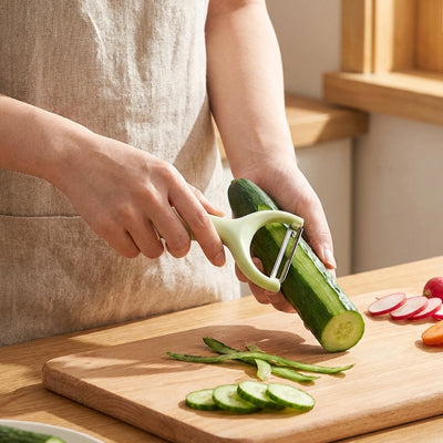eplucheur-pomme-de-terre-ergonomique-inox-plance-decouper