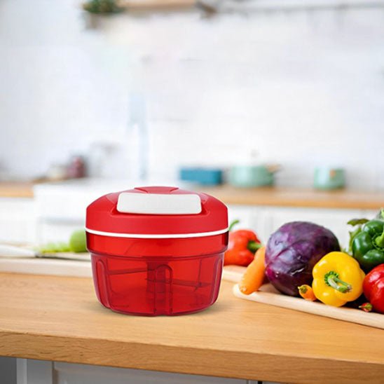 Hachoir manuel rouge de cuisine - ustensile hachage coloré et solide-poivron